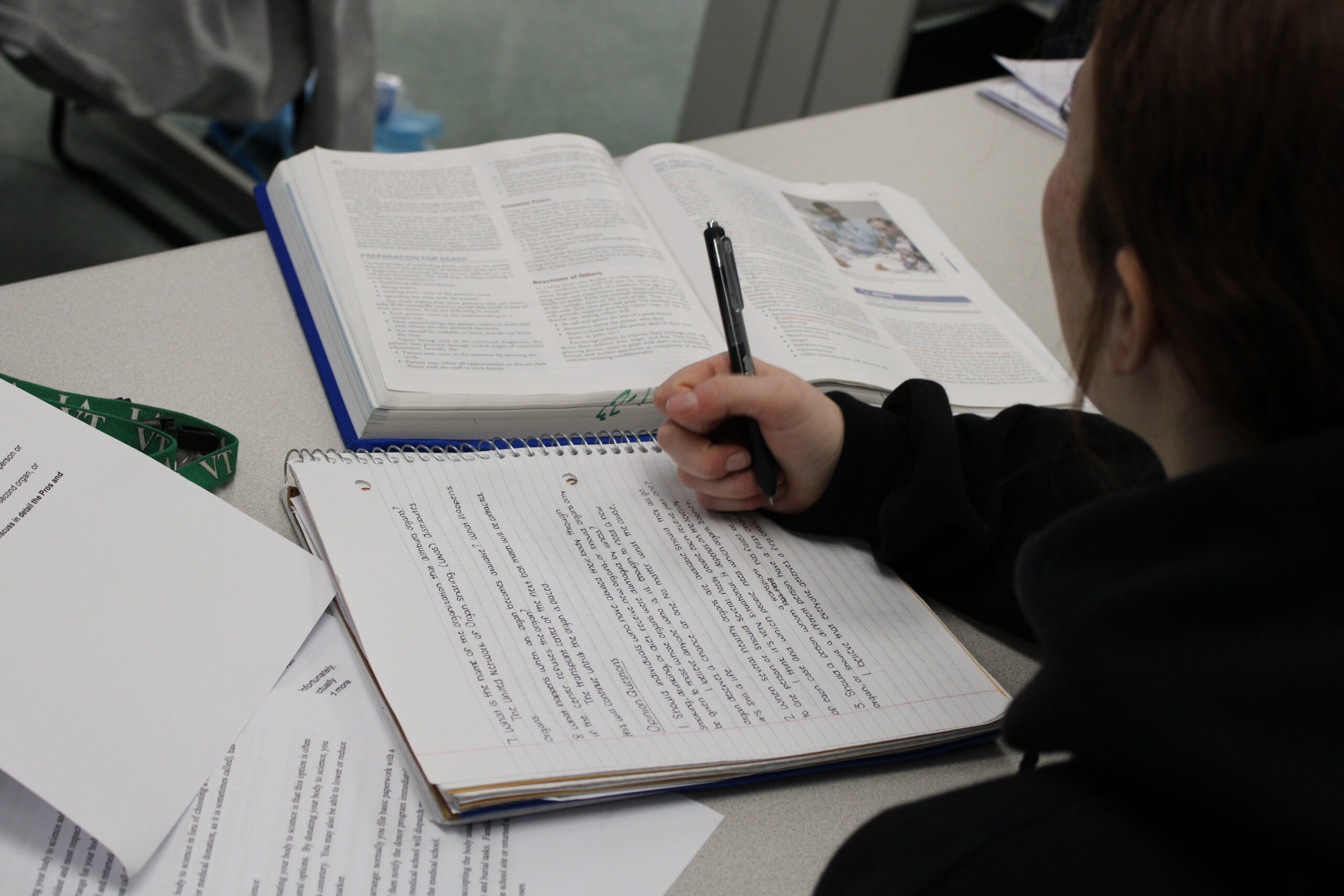 Nursing student doing paper work