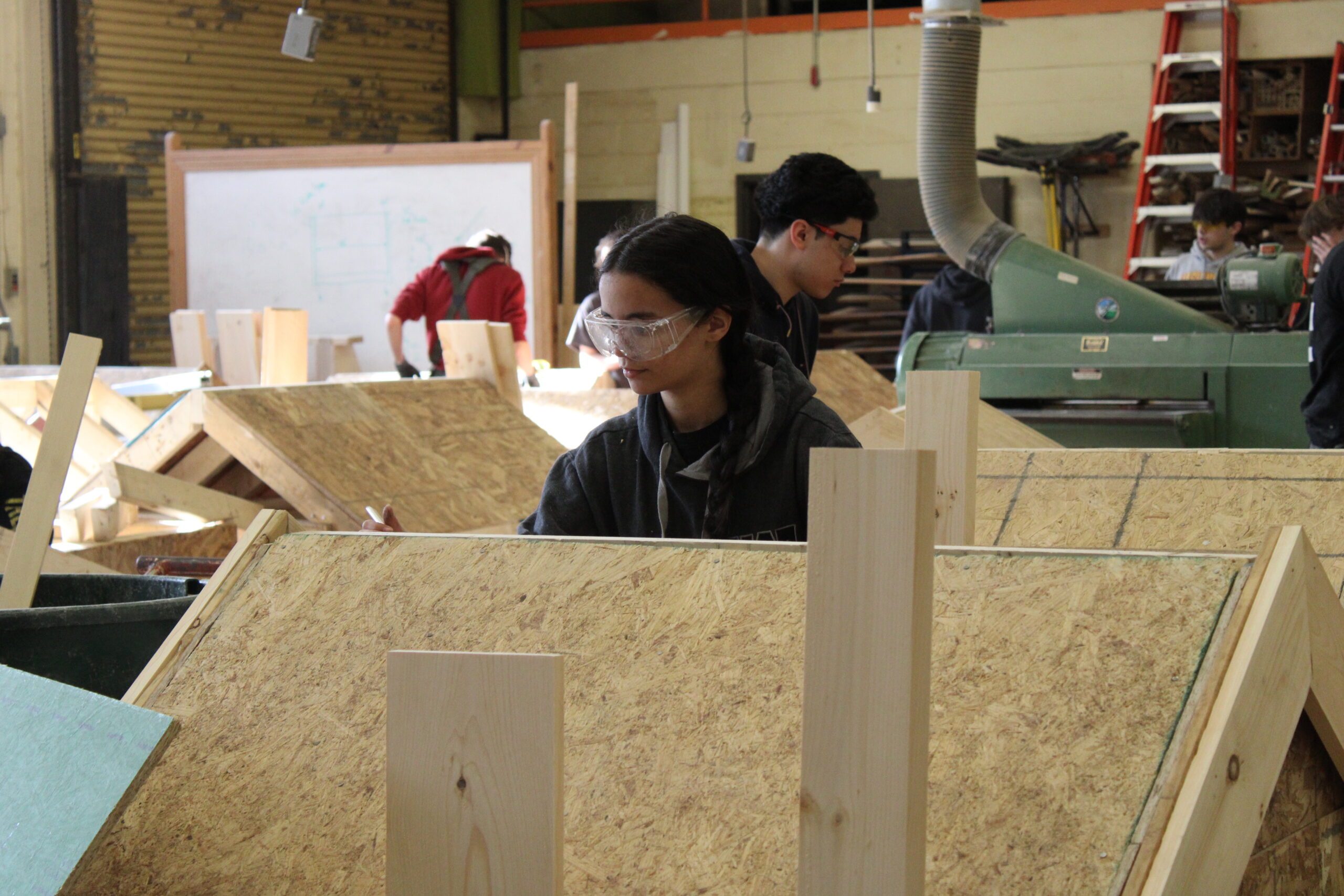 Students working with wood in Carpentry