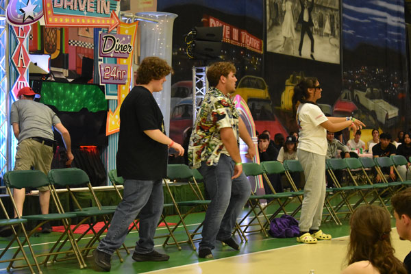 Kids dancing in a trance from the hypnotist at the 2024 after prom