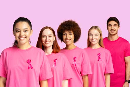 feature image for breast cancer day with diverse group wearing pink shirts