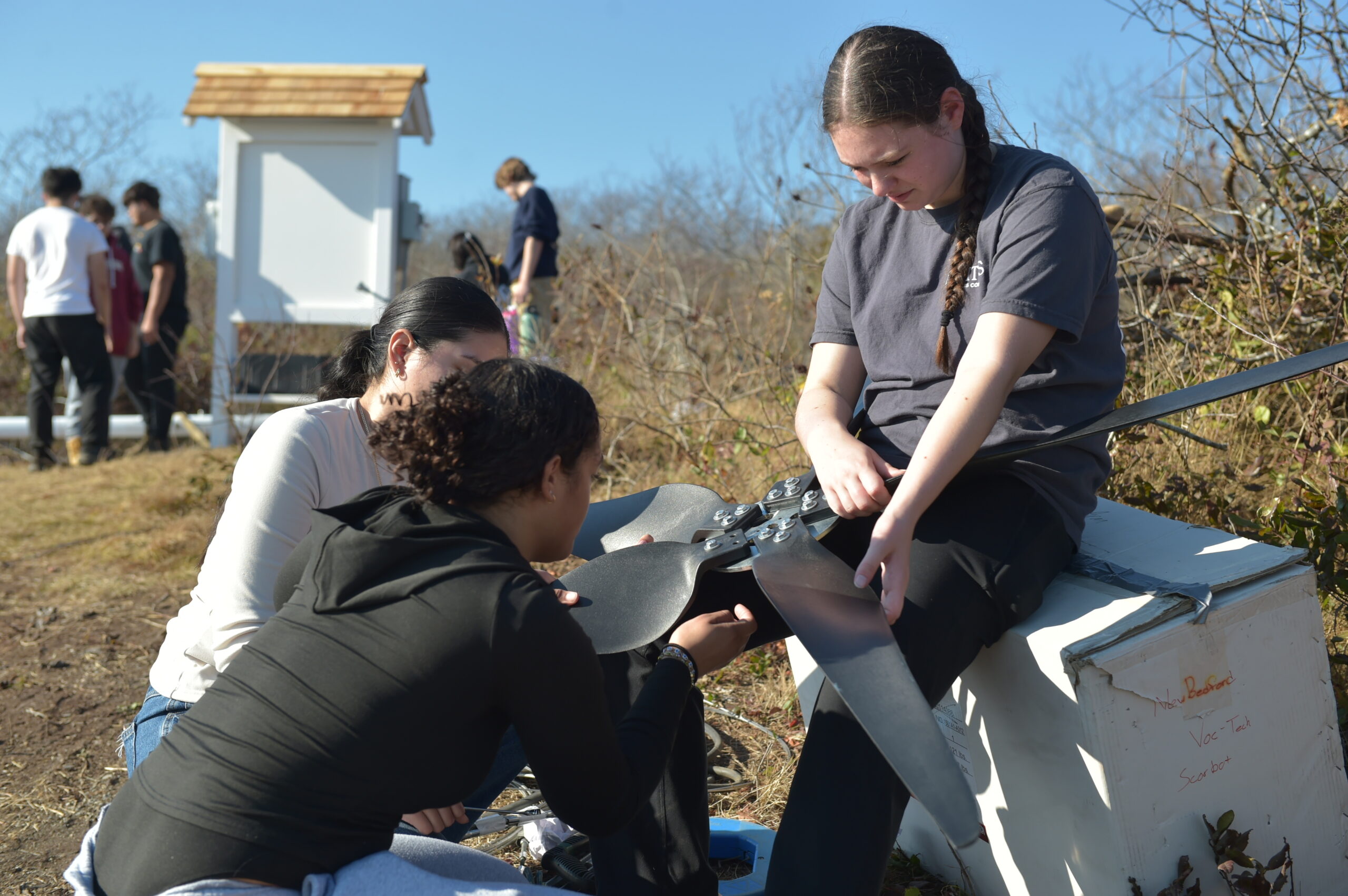 Student working on a wind turbine