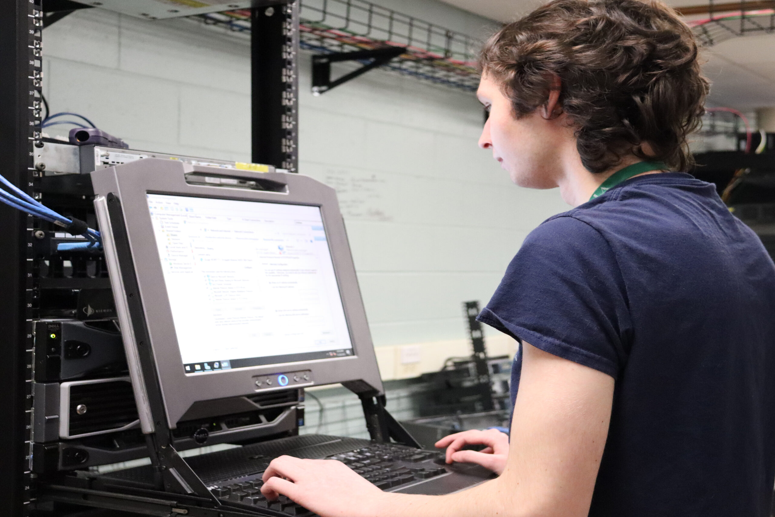 Student working in files on computer