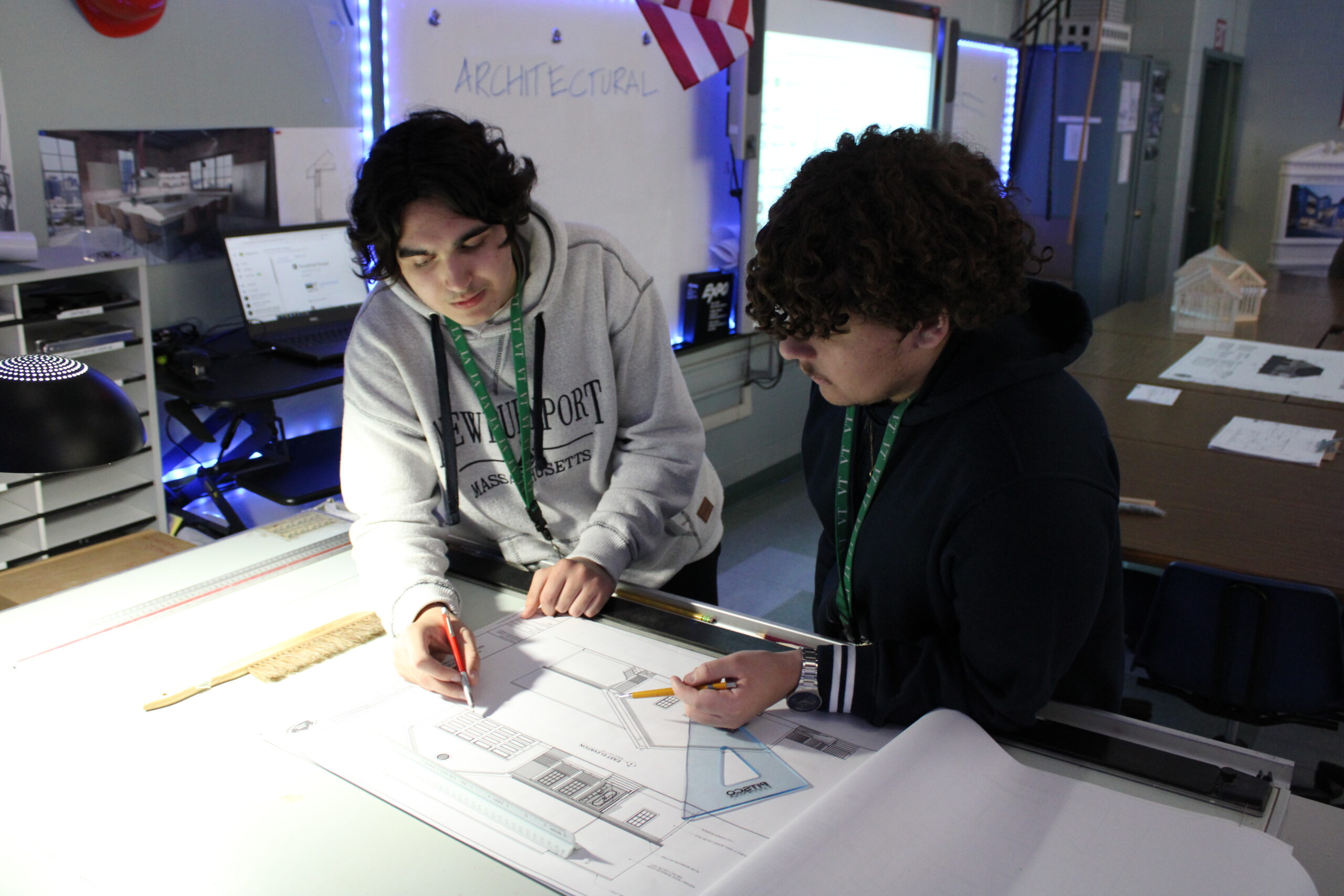 Students creating a sketch about the interior of a house