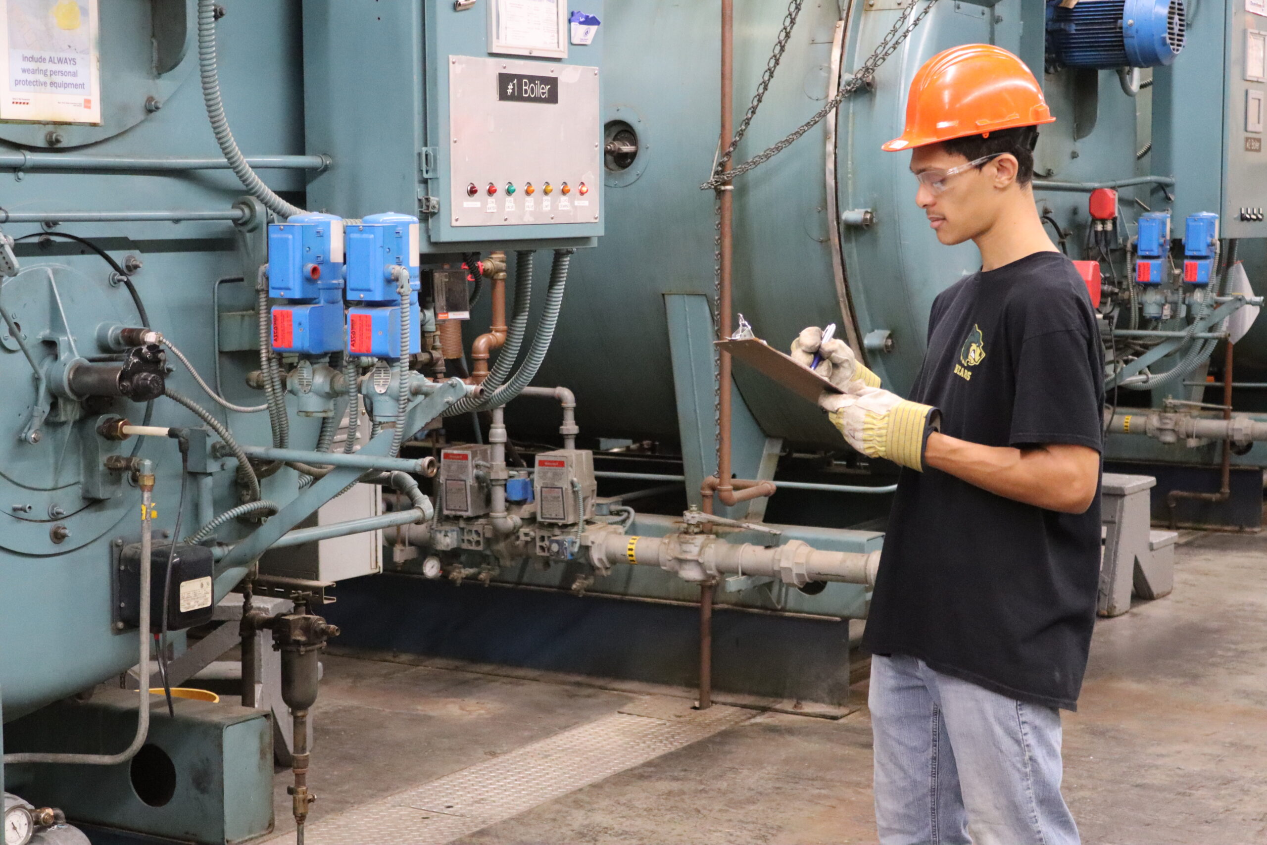 STEAM Student logging boiler readings