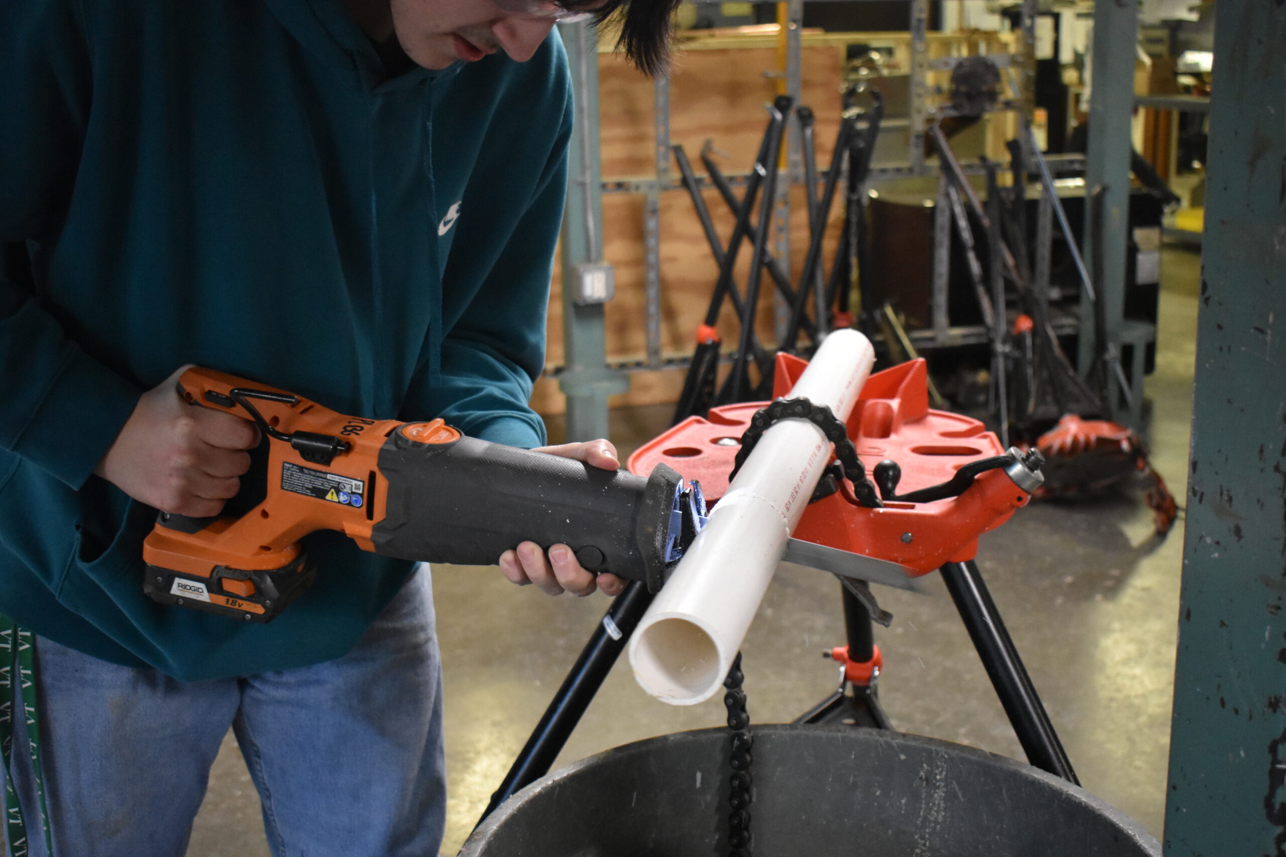  Student using a sawzall to cut the pvc pipe<br />
